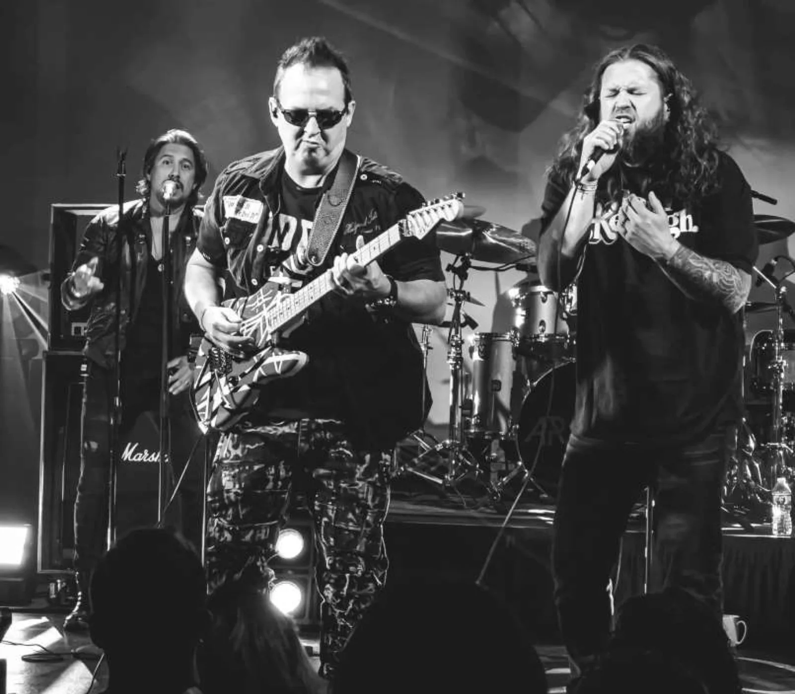 Adam DeGraide performing live, black and white